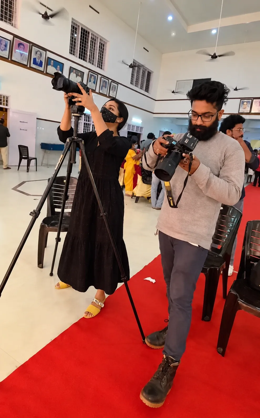 Aleena Gilbert and Althaf P Rasheed shooting photo and video at an event, before they founded Mantra Ads